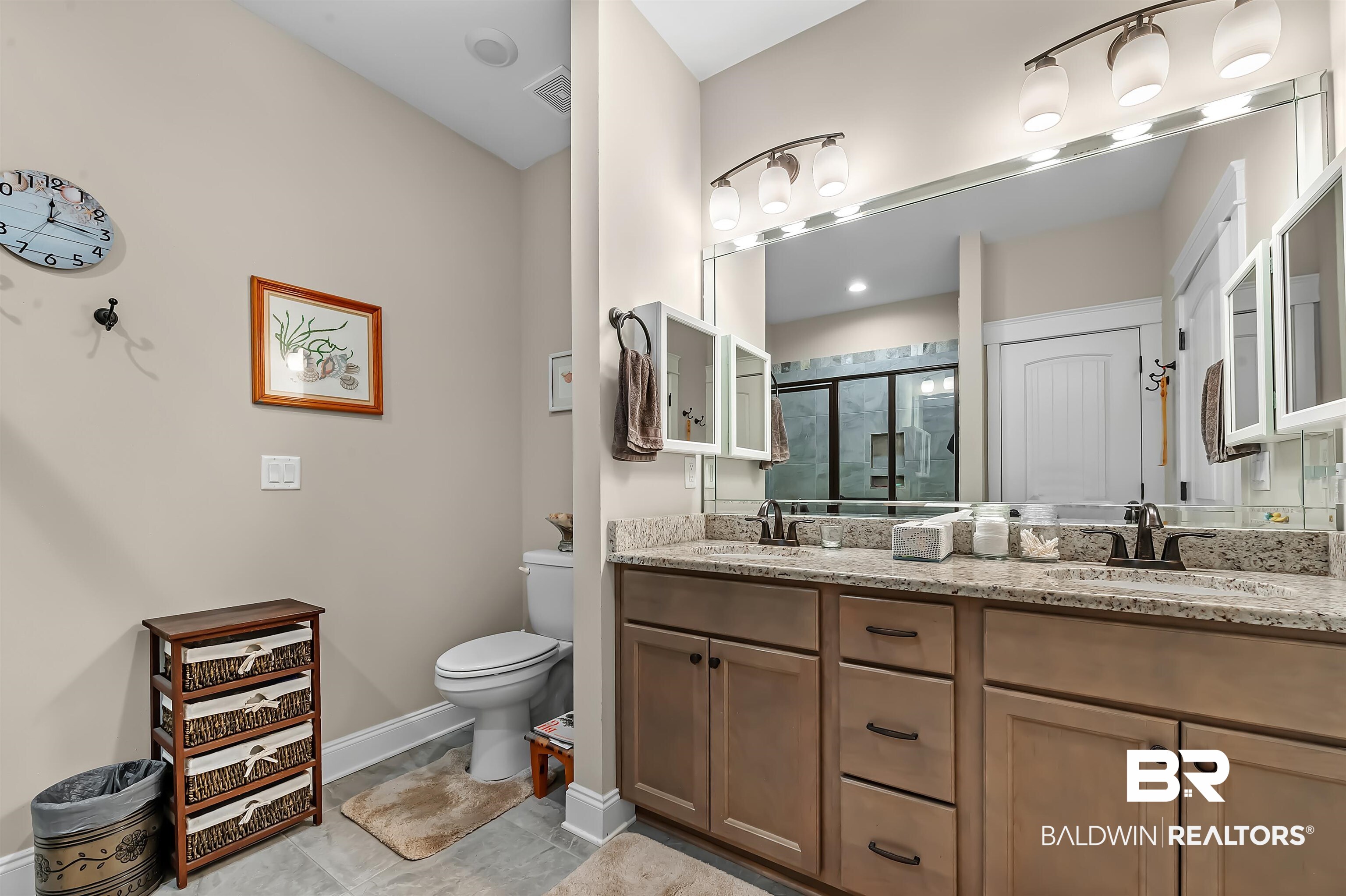 185 Mark Twain Loop Foley, AL 36535 - Photo 28 of 54 Bathroom featuring a shower with door, toilet, and vanity
