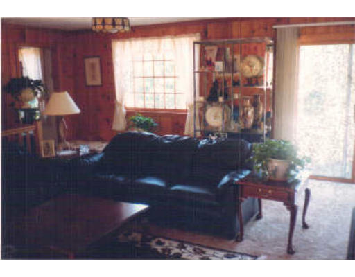 62 Ellsworth Road Rowley, MA 01969 - Photo 2 of 2 a living room with furniture and wooden floor