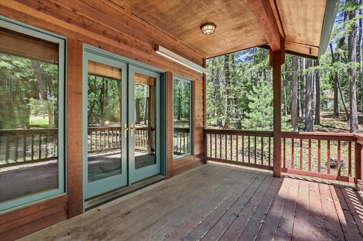 14517 North Bloomfield Road Nevada City, CA 95959 - Photo 66 of 78 a view of a porch with wooden floor and outdoor space