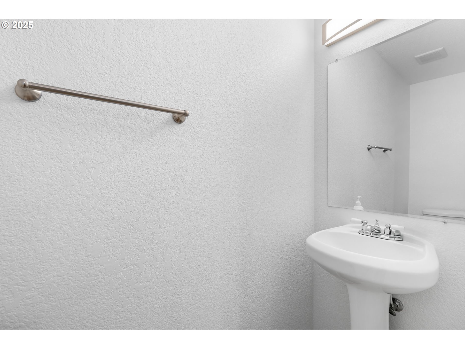 11938 Southeast Market Street Portland, OR 97216 - Photo 16 of 28 a bathroom with a sink and mirror