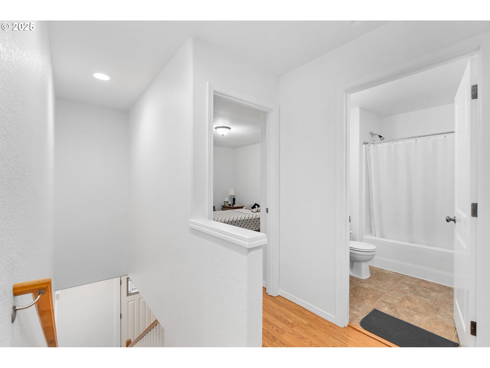 11938 Southeast Market Street Portland, OR 97216 - Photo 17 of 28 a bathroom with a sink a toilet and a mirror