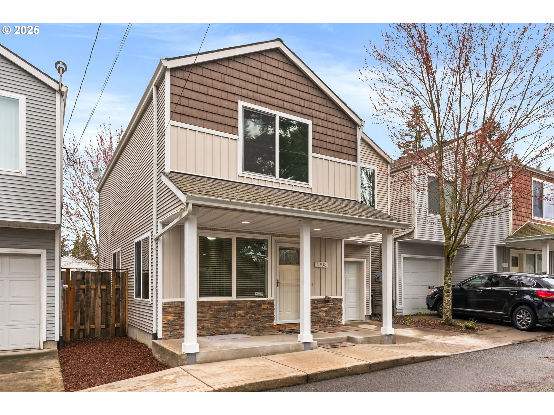 11938 Southeast Market Street Portland, OR 97216 - Photo 2 of 28 a black and white photo of a house