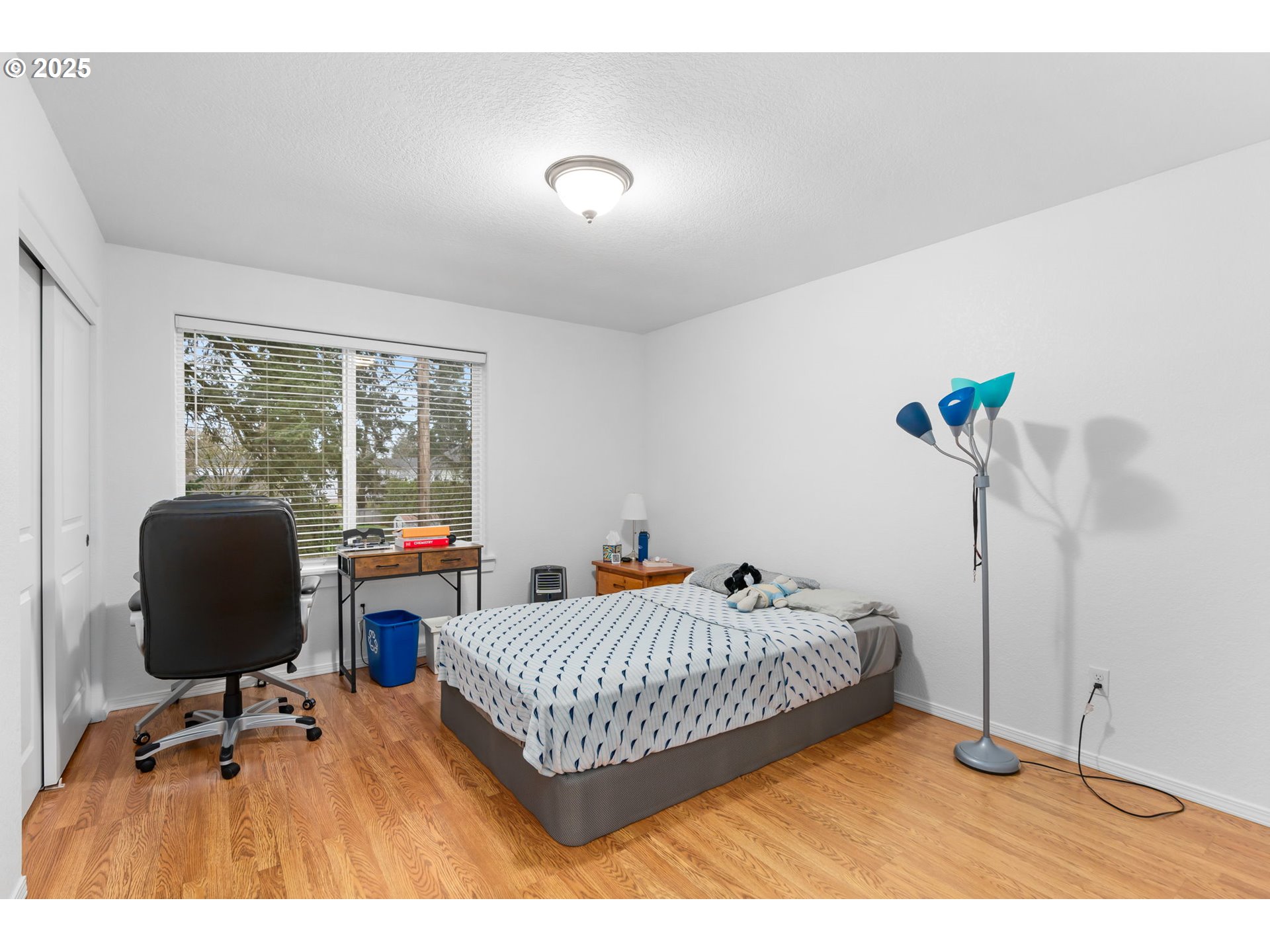 11938 Southeast Market Street Portland, OR 97216 - Photo 23 of 28 a bedroom with furniture and a window