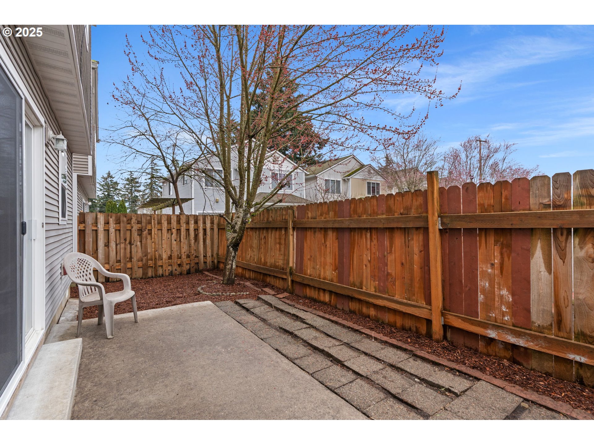 11938 Southeast Market Street Portland, OR 97216 - Photo 28 of 28 a backyard of a house with wooden fence
