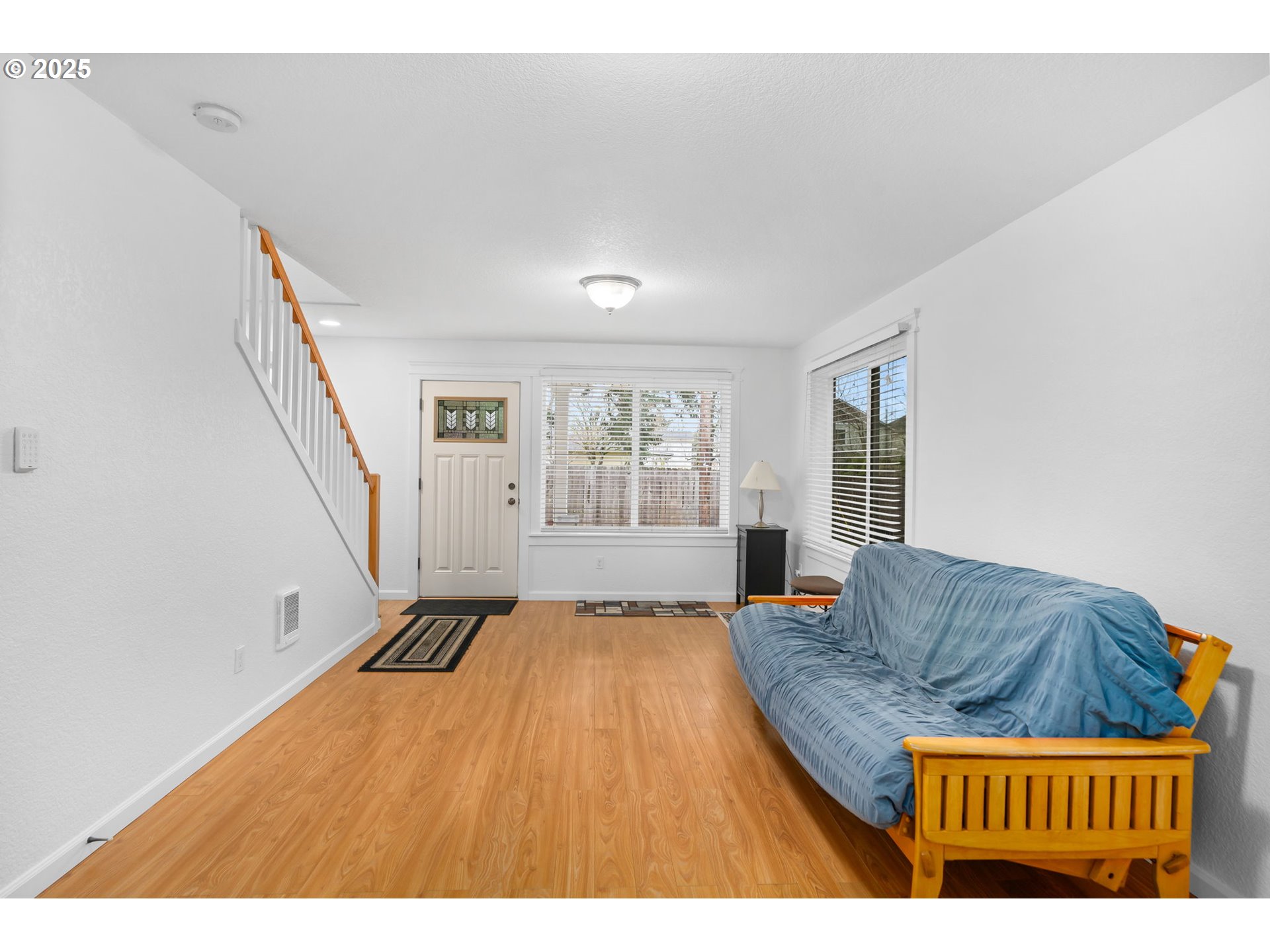 11938 Southeast Market Street Portland, OR 97216 - Photo 6 of 28 a living room with furniture and a large window