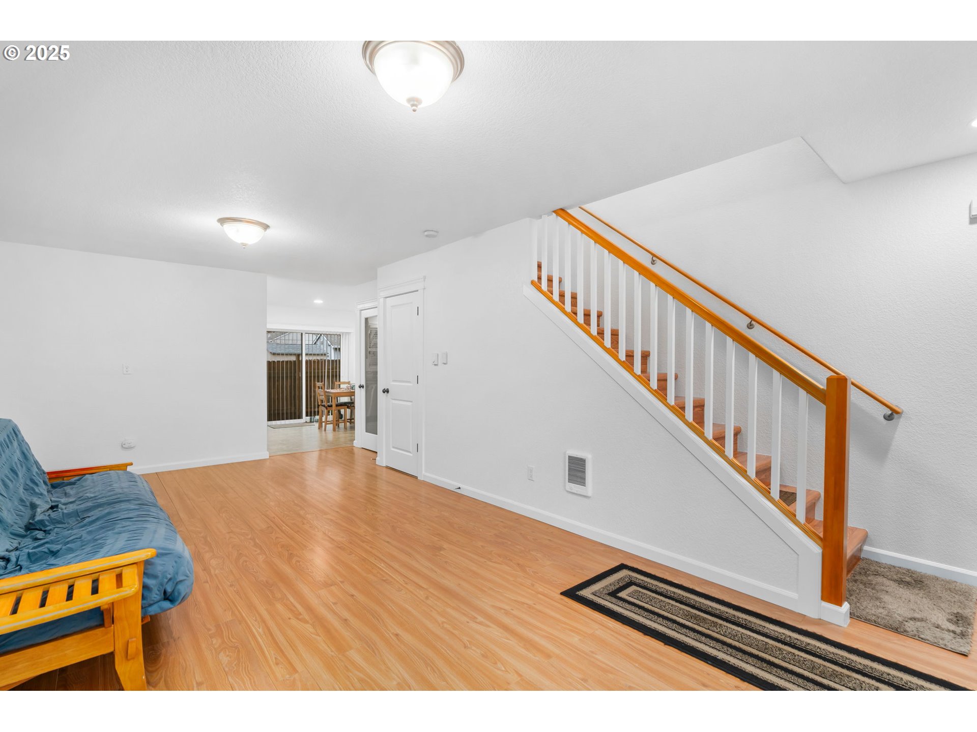 11938 Southeast Market Street Portland, OR 97216 - Photo 8 of 28 a view of staircase with wooden floor