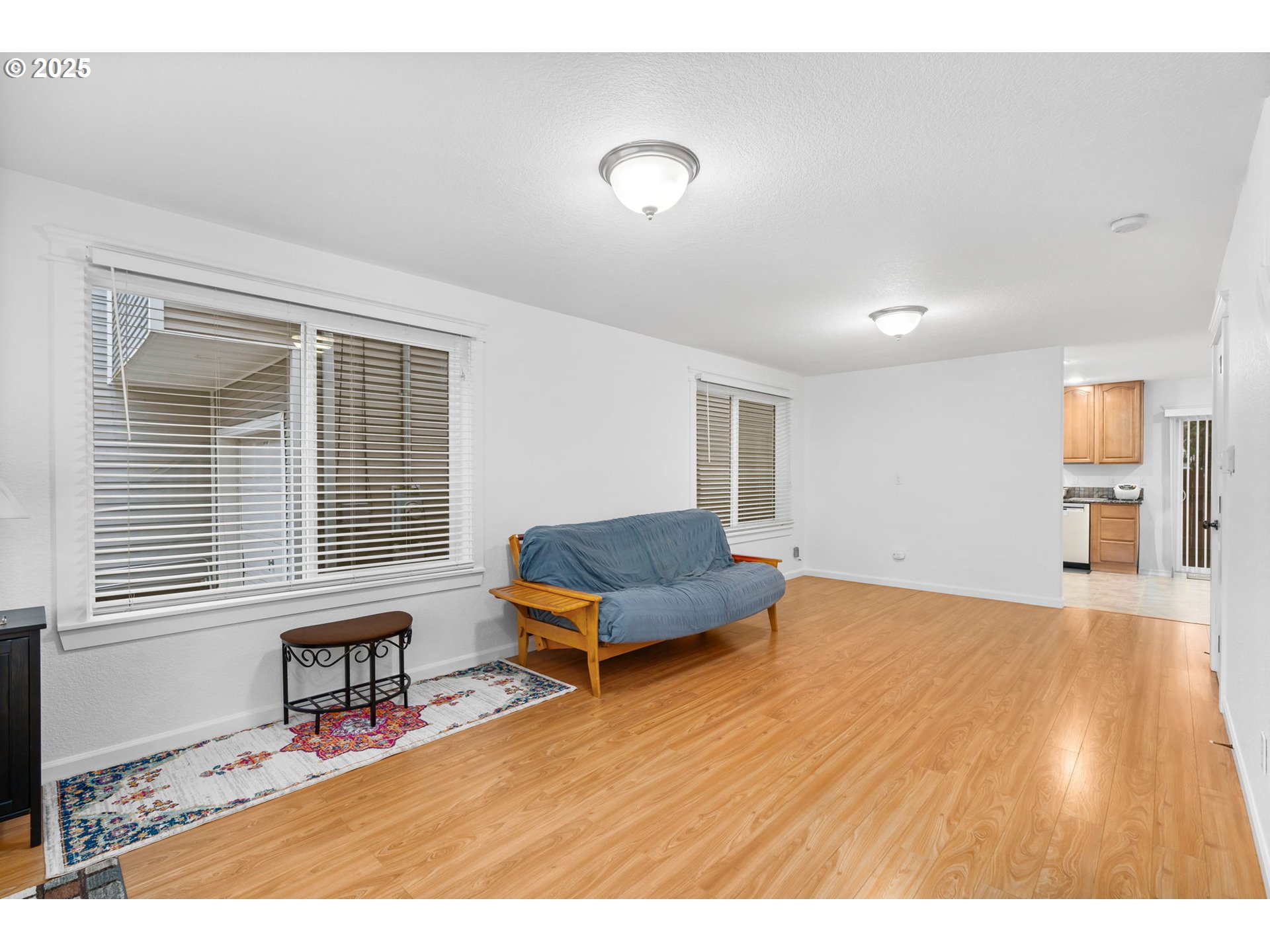 11938 Southeast Market Street Portland, OR 97216 - Photo 9 of 28 a living room with furniture and a window