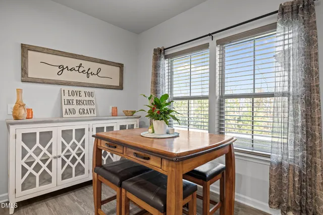 a view of a table and chairs in a room