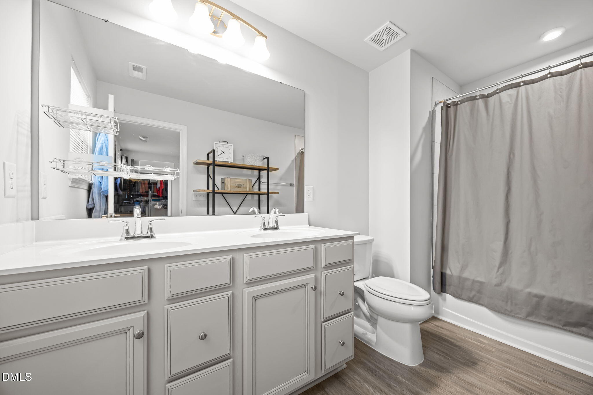 1624 Ripley Woods Street Wake Forest, NC 27587 - Photo 26 of 41 a bathroom with a sink toilet and shower