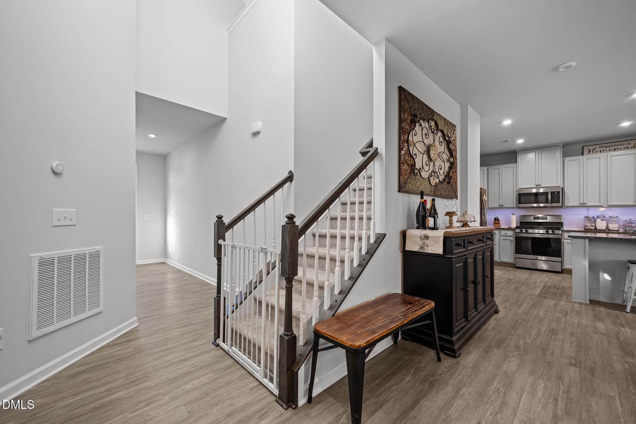 1624 Ripley Woods Street Wake Forest, NC 27587 - Photo 7 of 41 a view of kitchen with furniture and wooden floor