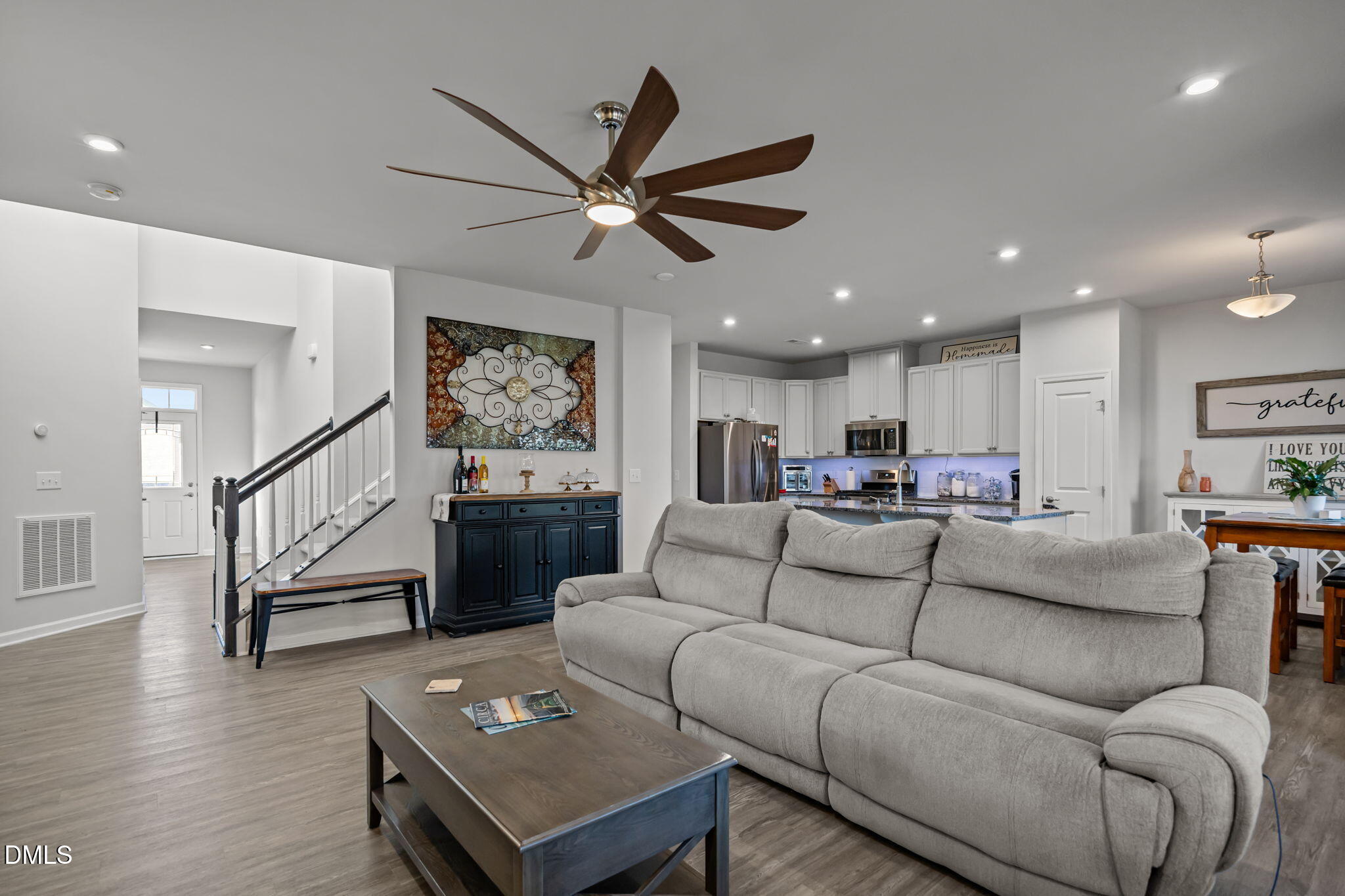 1624 Ripley Woods Street Wake Forest, NC 27587 - Photo 9 of 41 a living room with furniture and wooden floor