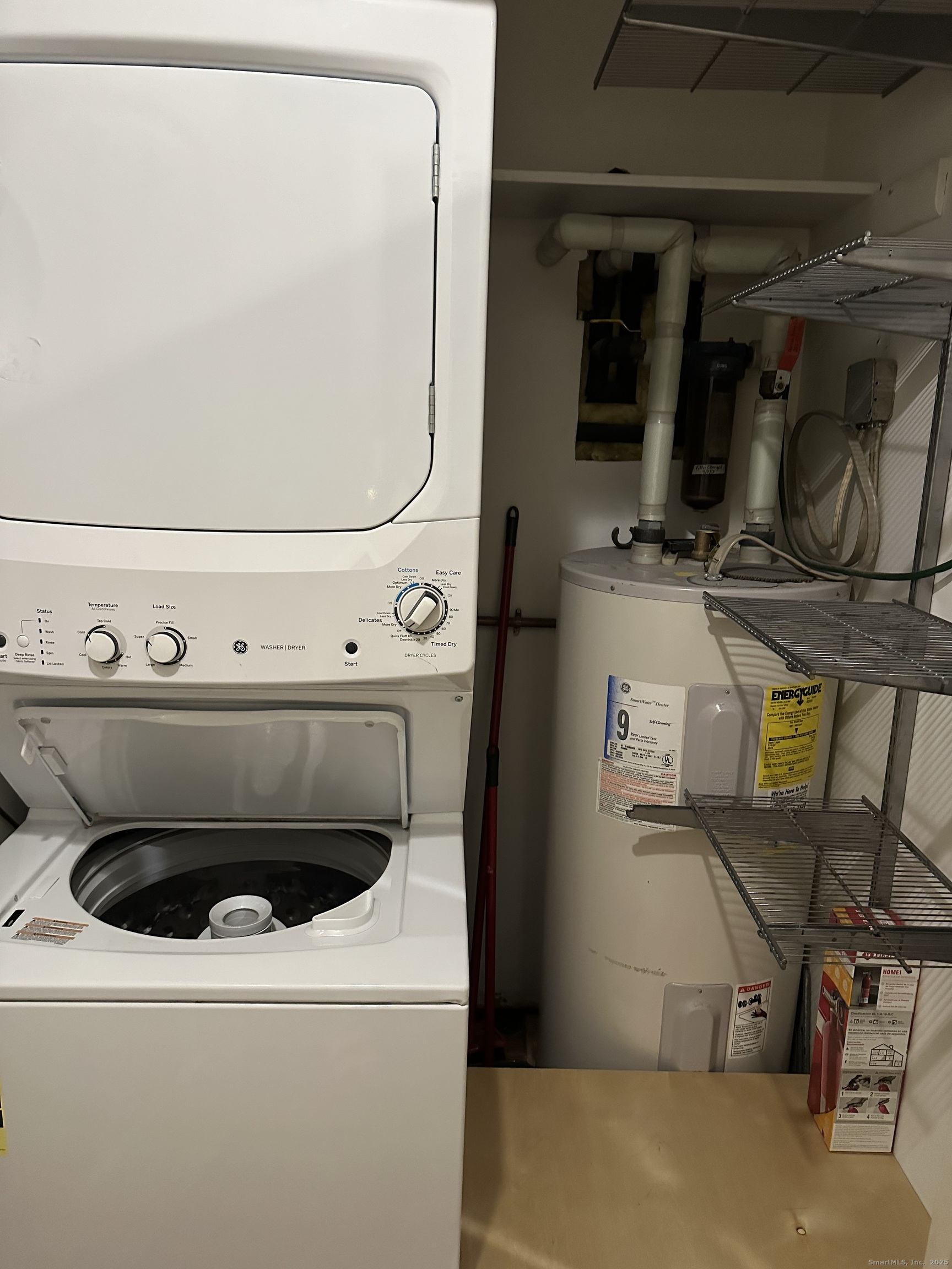 697 Cove Road, Unit 1E Stamford, CT 06902 - Photo 14 of 14 a utility room with dryer and washer