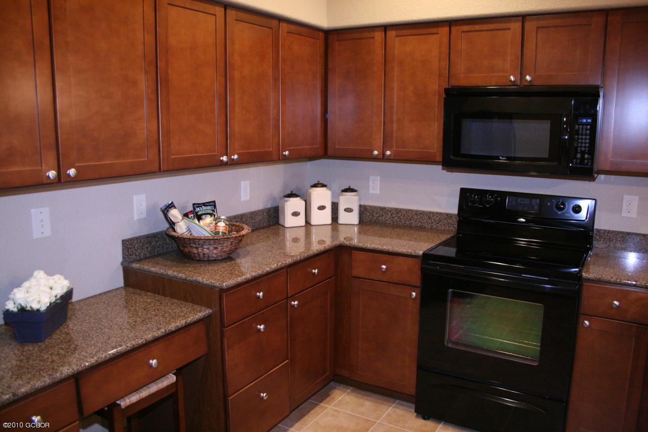 180 Sterling Loop, Unit 402 Fraser, CO 80442 - Photo 11 of 21 11 Sterling Pointe Model Kitchen Stove