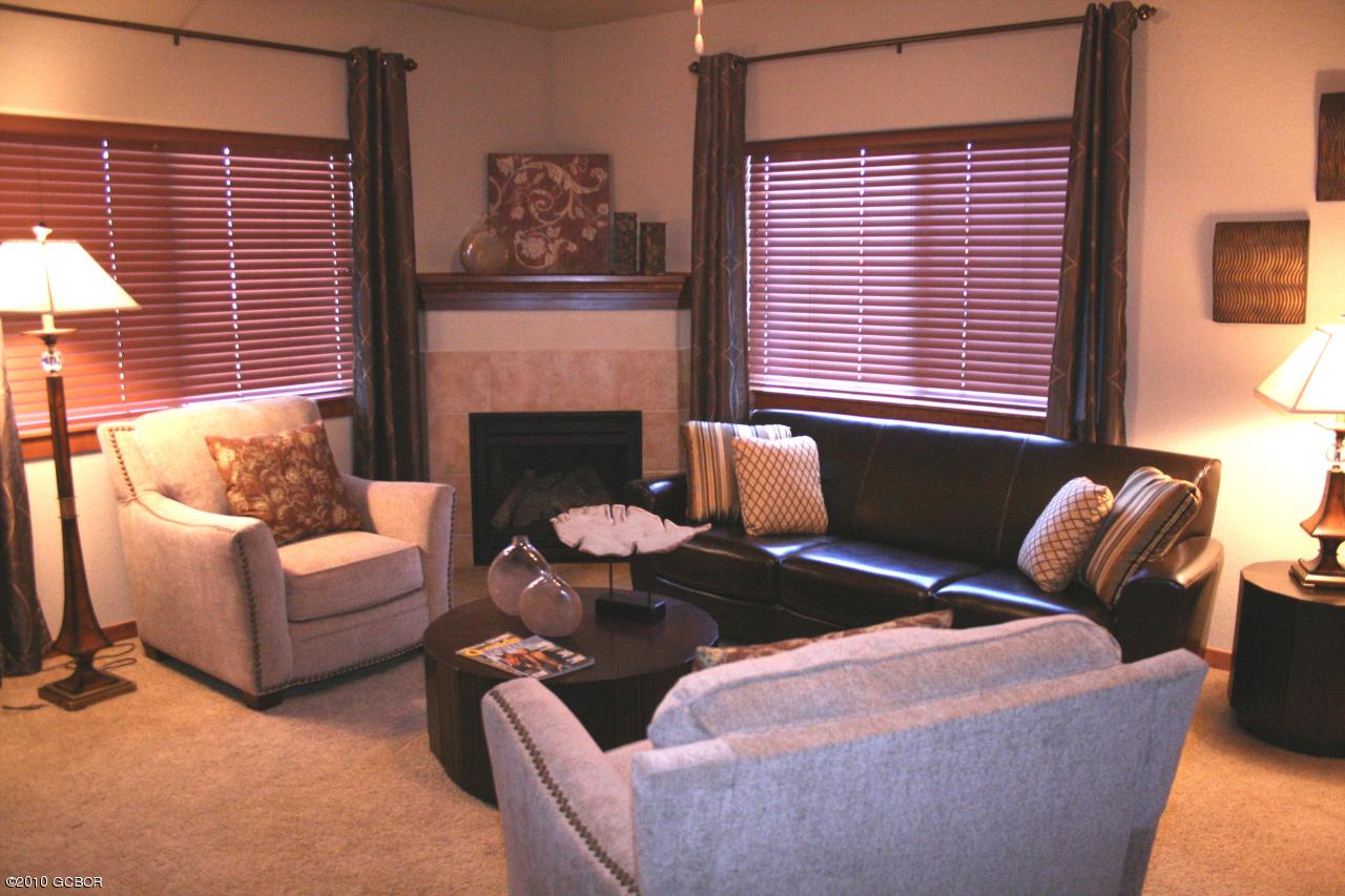 180 Sterling Loop, Unit 402 Fraser, CO 80442 - Photo 7 of 21 7 Sterling Pointe Model Living Fireplace