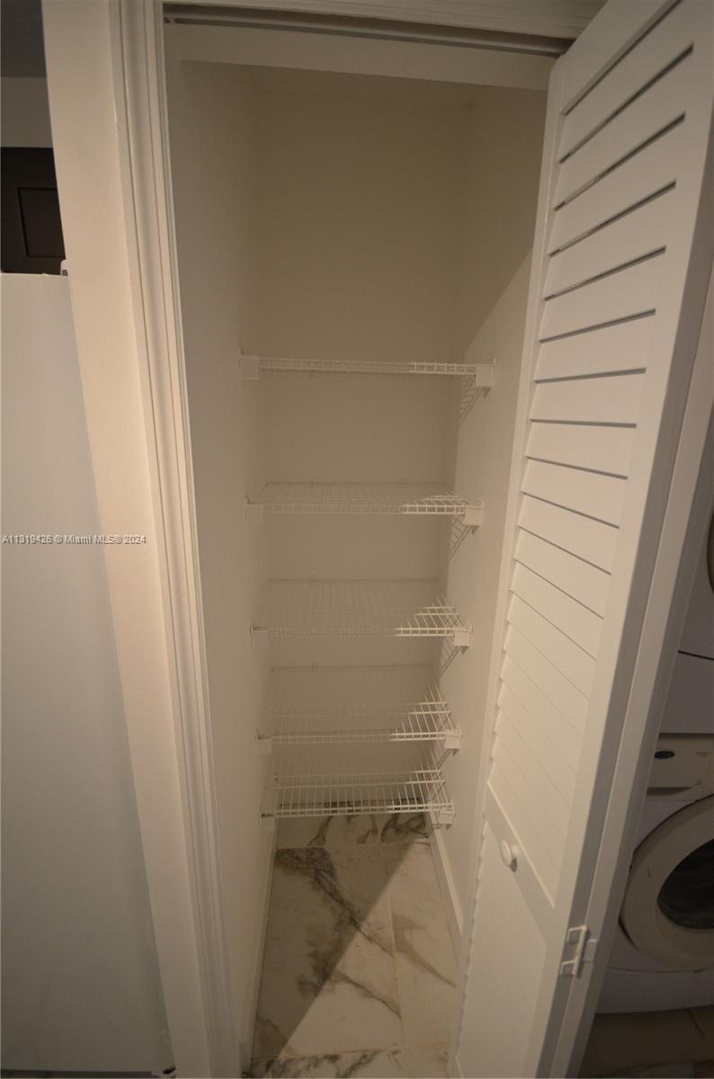 1241 Southeast 29th Street, Unit 102 Homestead, FL 33035 - Photo 15 of 23 a bathroom with a sink and a shower