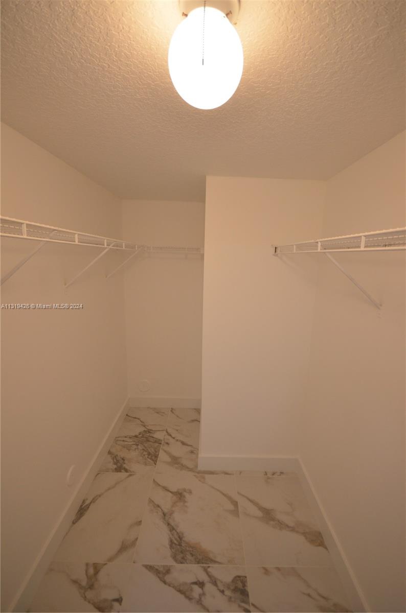 1241 Southeast 29th Street, Unit 102 Homestead, FL 33035 - Photo 22 of 23 a view of a small space