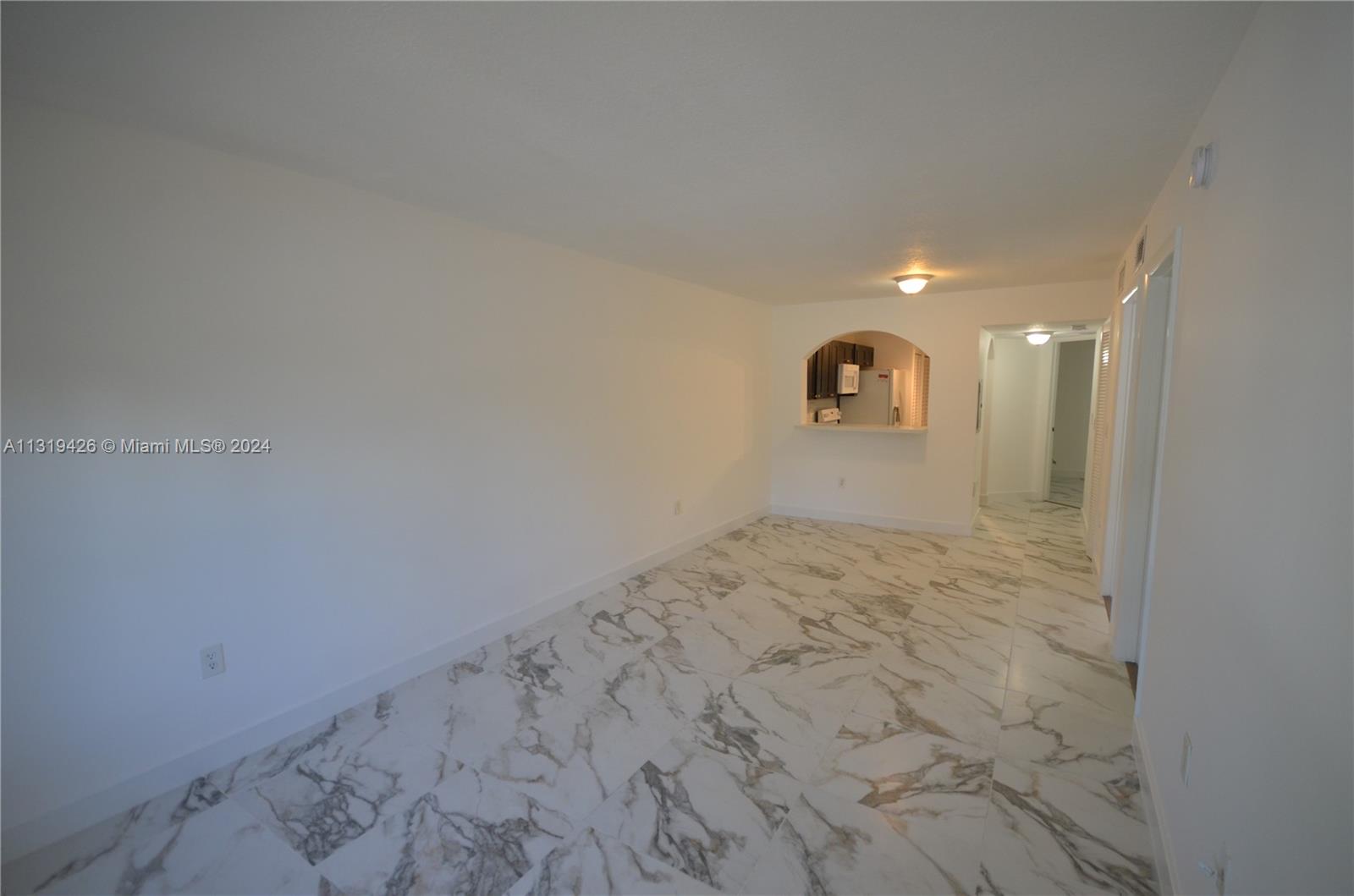 1241 Southeast 29th Street, Unit 102 Homestead, FL 33035 - Photo 3 of 23 a view of empty room