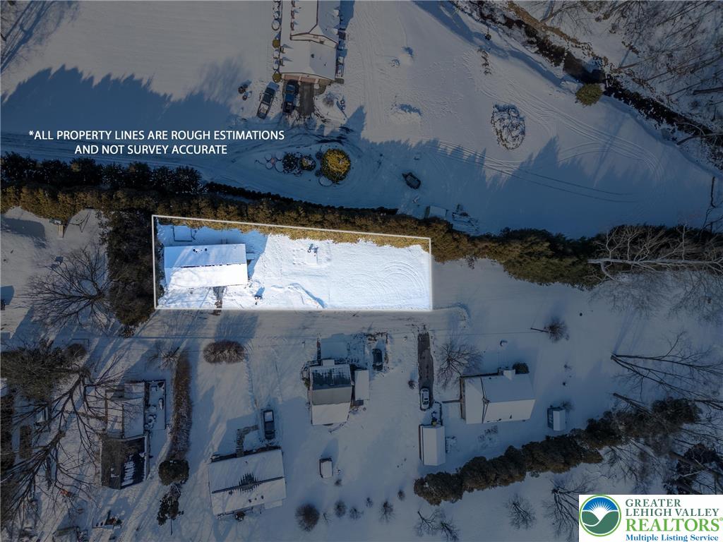 4859 Vera Cruz Road Emmaus, PA 18049 - Photo 23 of 23 an aerial view of residential house with outdoor space and parking