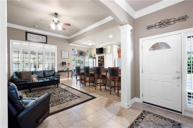a living room with furniture and a window