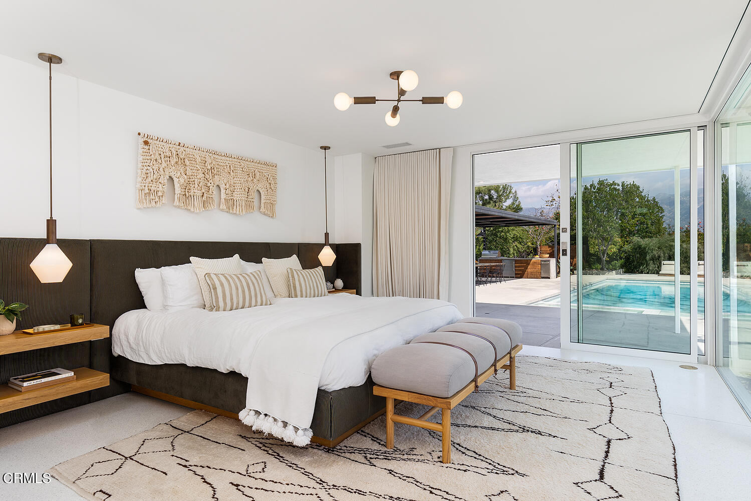 95 Tustin Road Pasadena, CA 91105 - Photo 19 of 41 a bedroom with a bed and glass window