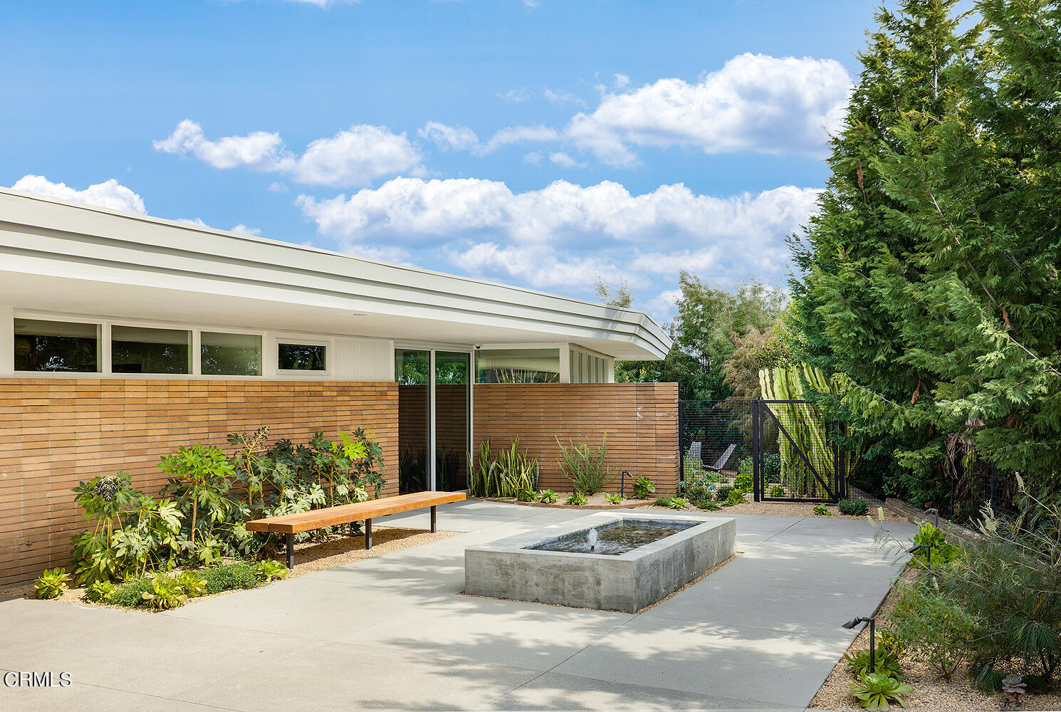 95 Tustin Road Pasadena, CA 91105 - Photo 2 of 41 a view of a house with sitting area and garden