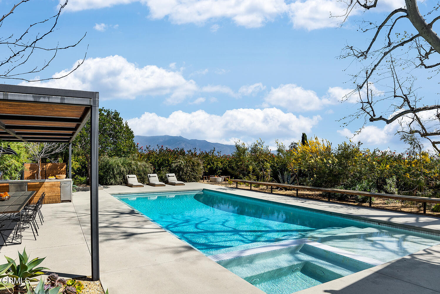 95 Tustin Road Pasadena, CA 91105 - Photo 34 of 41 a view of a swimming pool with a patio