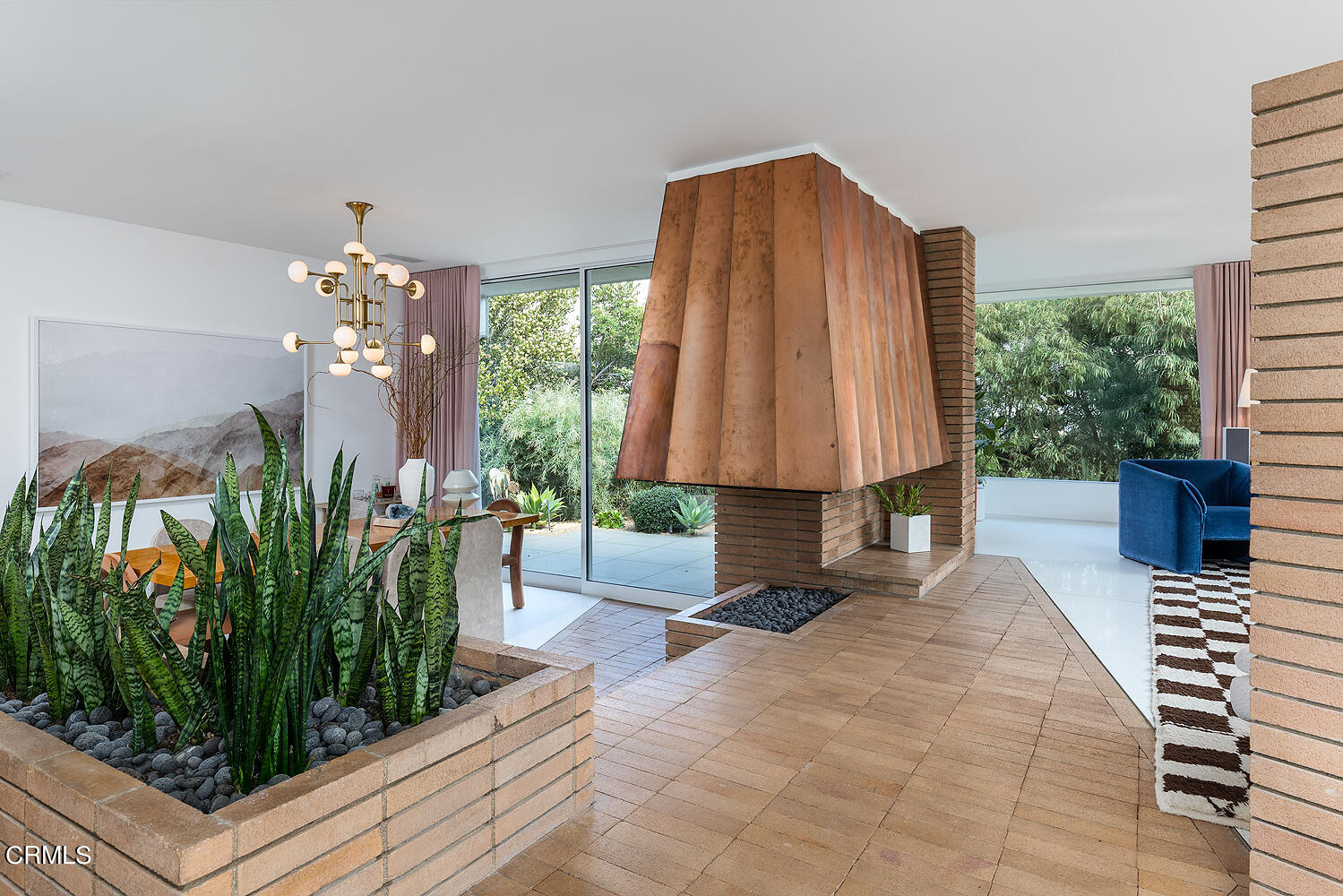 95 Tustin Road Pasadena, CA 91105 - Photo 4 of 41 a living room with furniture a chandelier and a large window