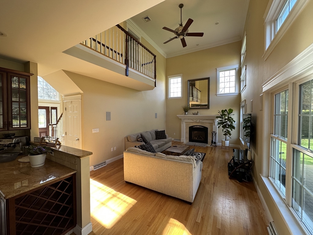 7 Rising Corner Road Southwick, MA 01077 - Photo 11 of 42 a living room with furniture and a fireplace