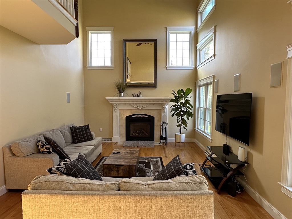 7 Rising Corner Road Southwick, MA 01077 - Photo 12 of 42 a living room with furniture fireplace and flat screen tv