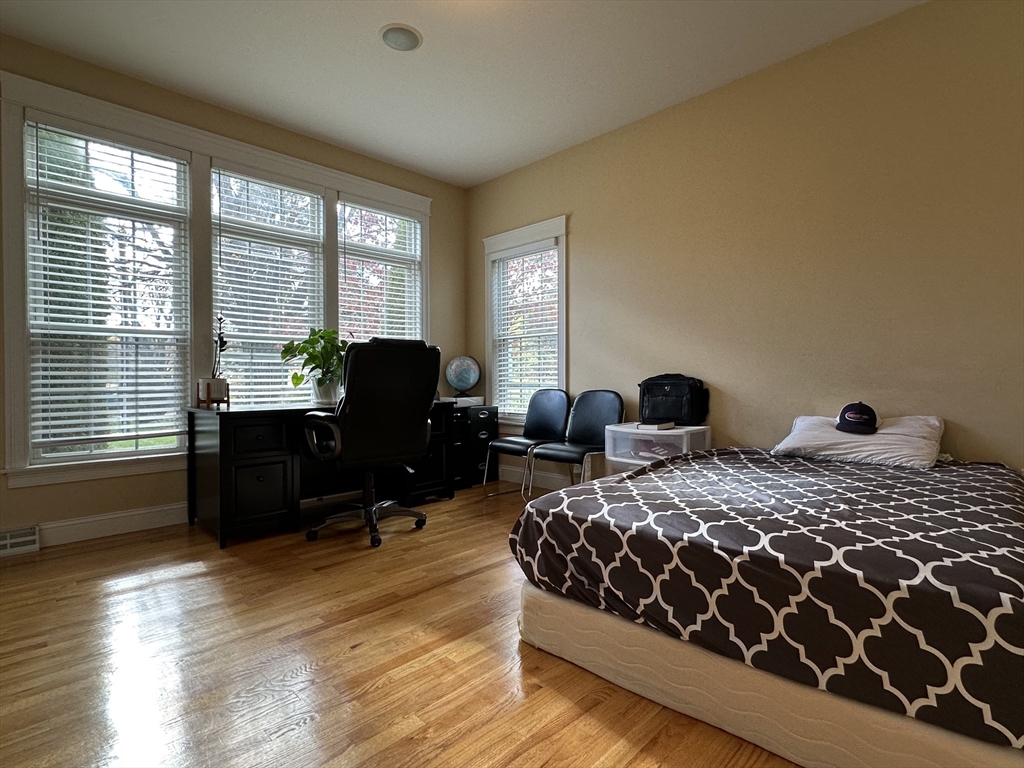 7 Rising Corner Road Southwick, MA 01077 - Photo 15 of 42 a bedroom with two beds and wooden floor