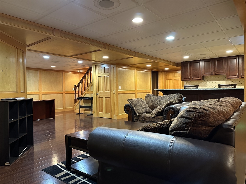 7 Rising Corner Road Southwick, MA 01077 - Photo 25 of 42 a living room with furniture and kitchen view