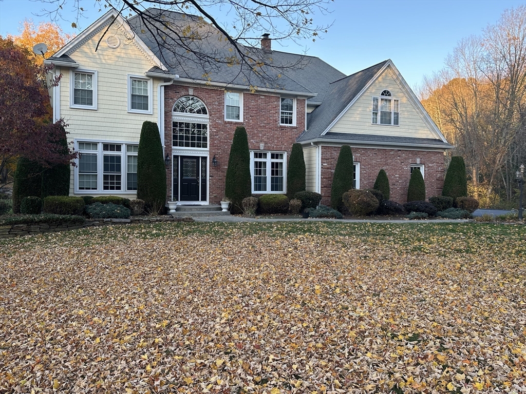 7 Rising Corner Road Southwick, MA 01077 - Photo 3 of 42 a front view of a house with garden