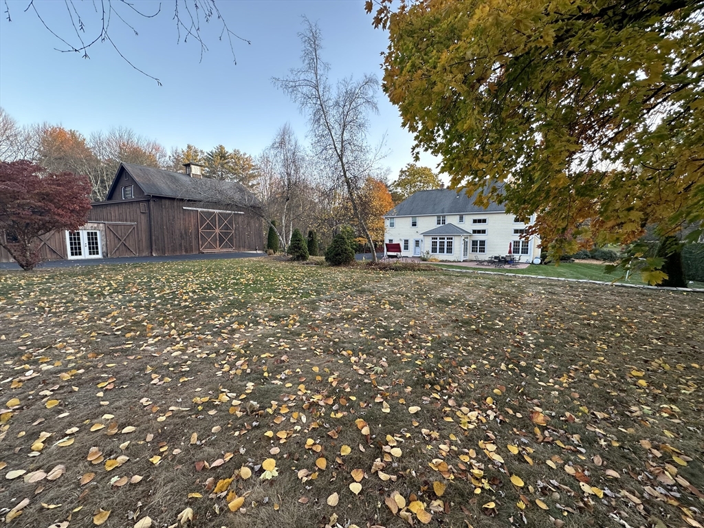 7 Rising Corner Road Southwick, MA 01077 - Photo 35 of 42 a view of a house with a yard