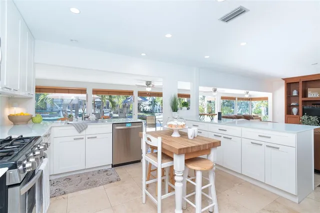 a bedroom with a bed and a potted plant