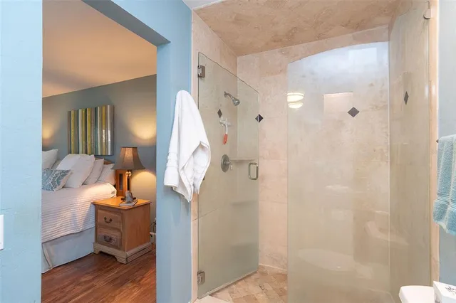 a view of a house with a yard patio and swimming pool