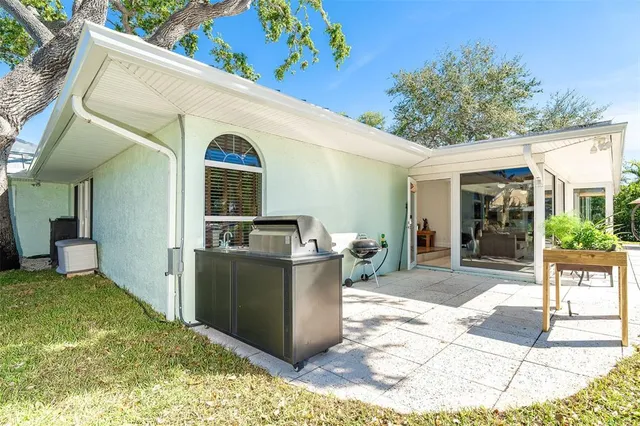 a view of a pathway with a patio
