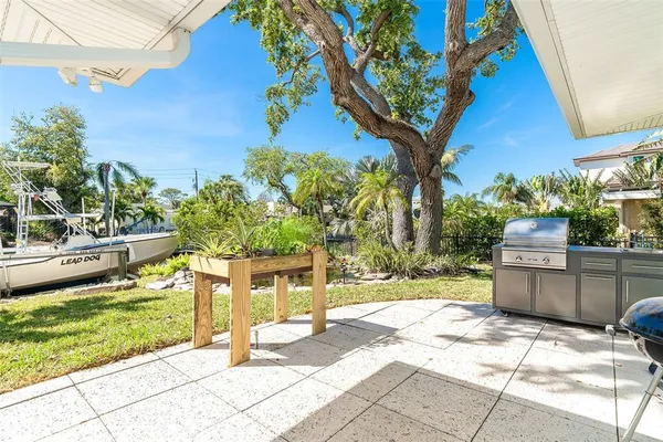a view of a pathway with a patio