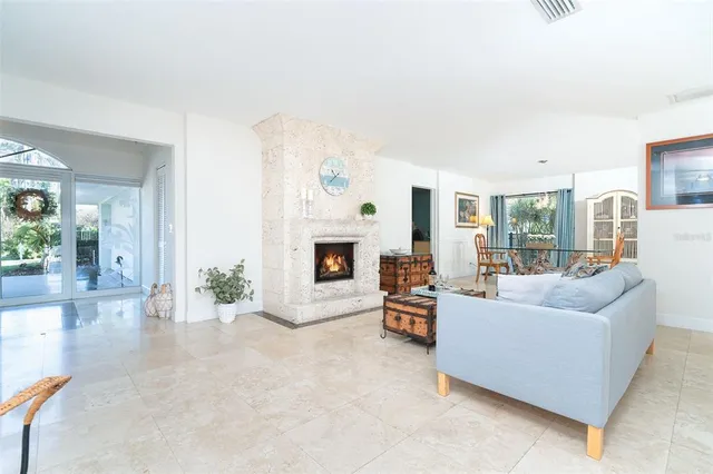 a kitchen with stainless steel appliances granite countertop a stove a sink a microwave and a refrigerator