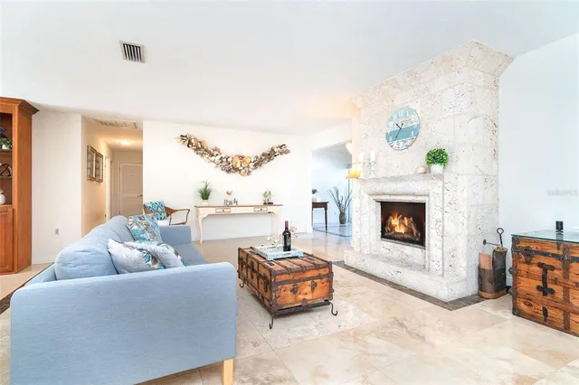 a kitchen with appliances a sink and cabinets