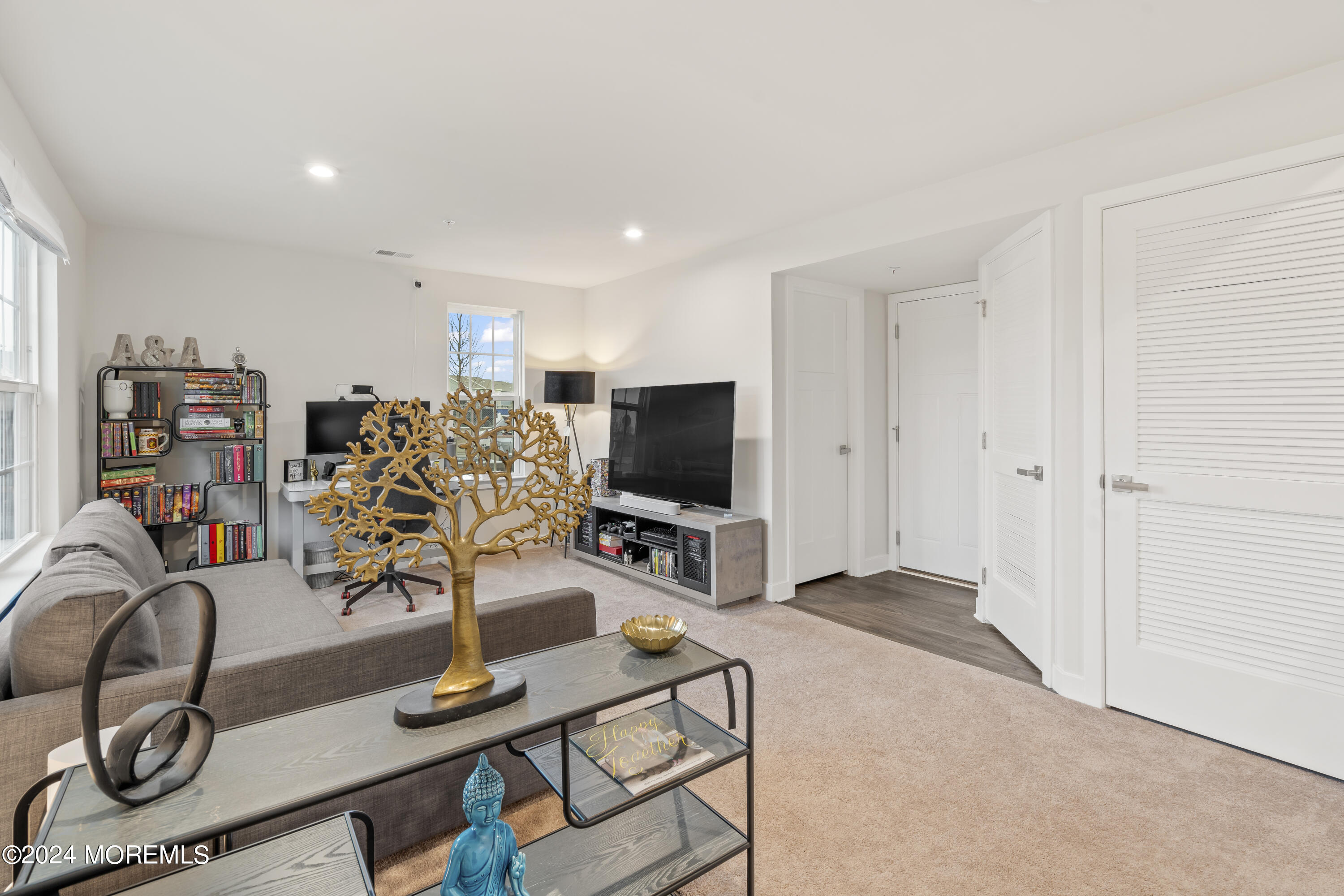 83 Anchor Way Cliffwood, NJ 07721 - Photo 4 of 27 a living room with furniture and a flat screen tv