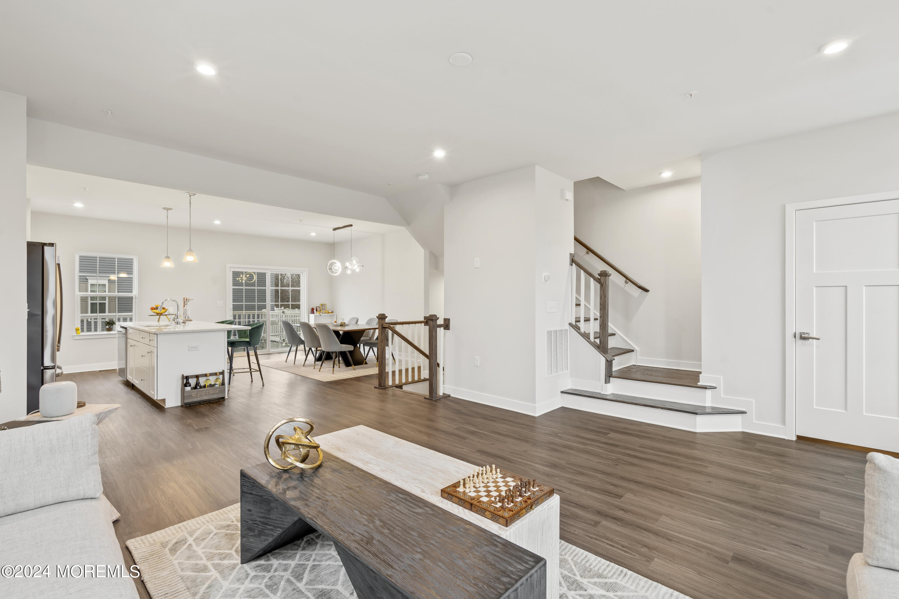 83 Anchor Way Cliffwood, NJ 07721 - Photo 10 of 27 a living room with furniture and a wooden floor