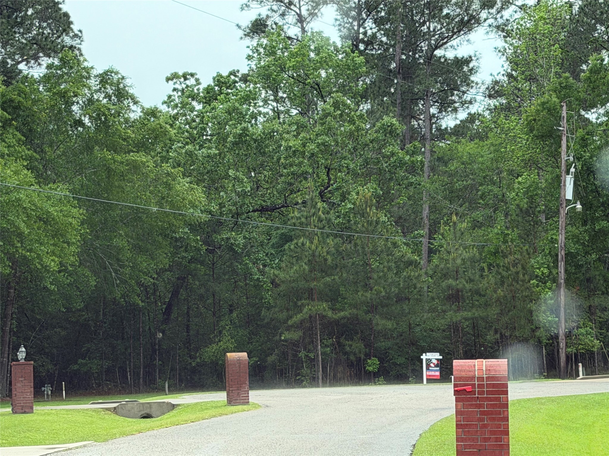 Tbd Agassi Court Magnolia, TX 77354 - Photo 5 of 7 At the end of a cul-de-sac street