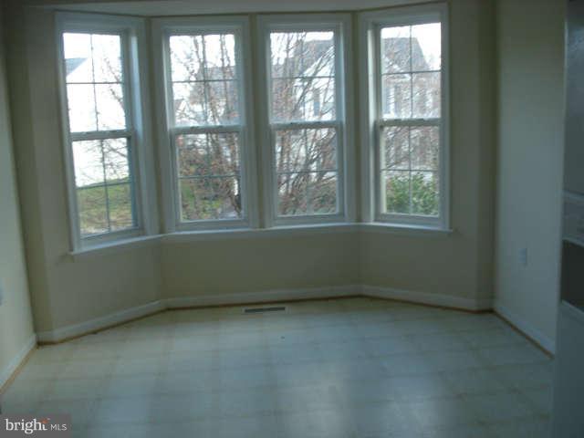 104 Limited Drive Ranson, WV 25438 - Photo 4 of 13 an empty room with a window