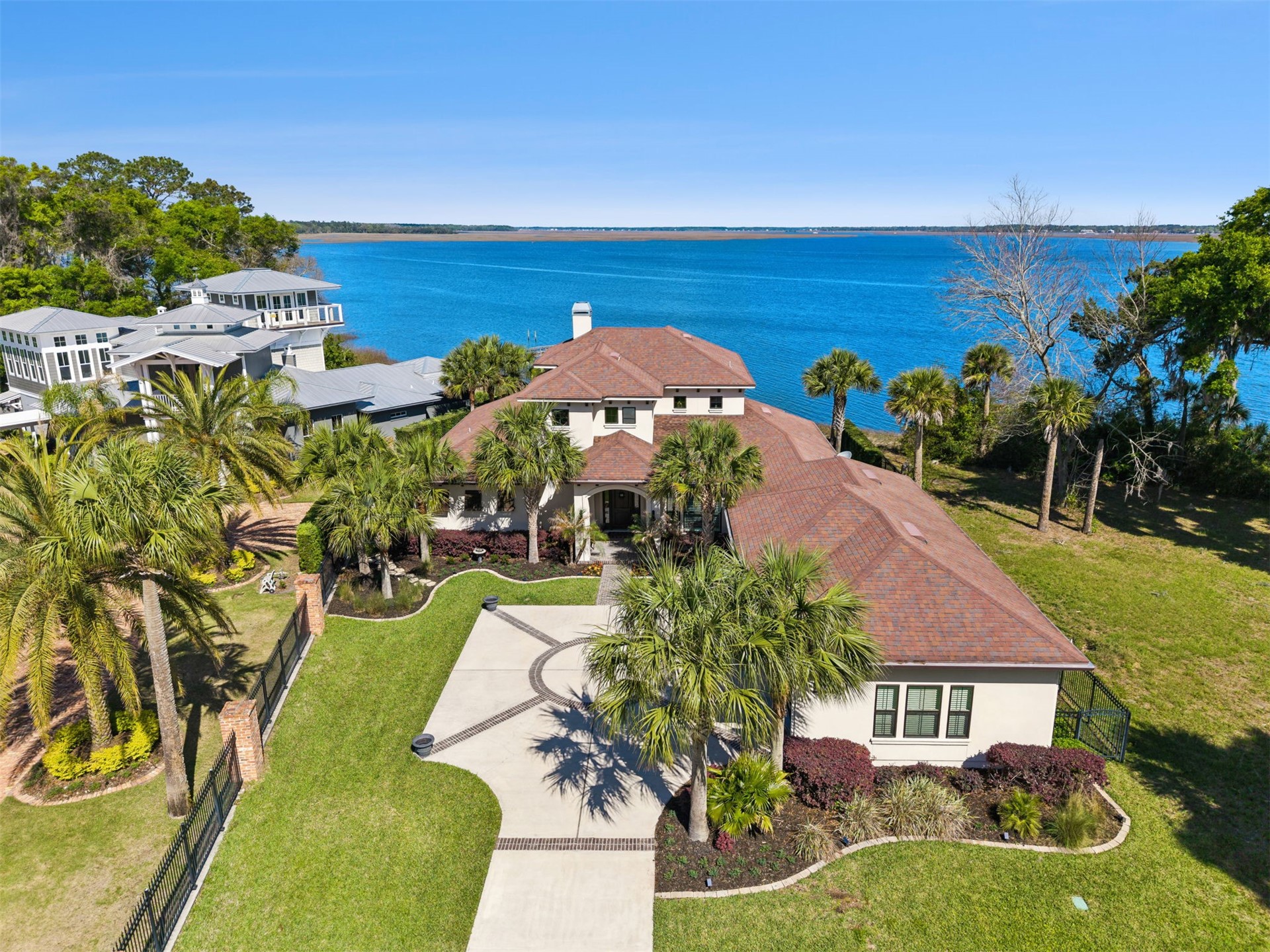 an aerial view of a house with yard swimming pool and outdoor seating
