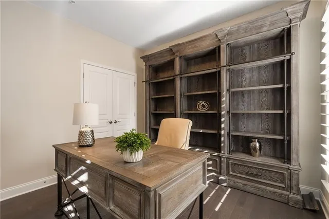 a view of a workspace with furniture