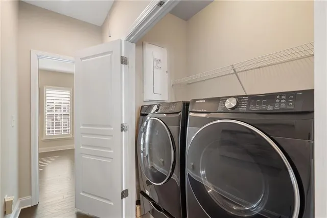 a utility room with dryer and washer