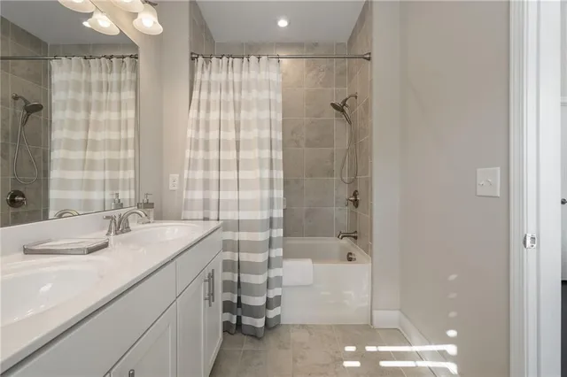 a bathroom with a sink and a shower