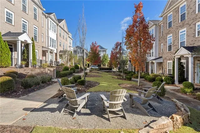 a view of a chairs and tables in the patio