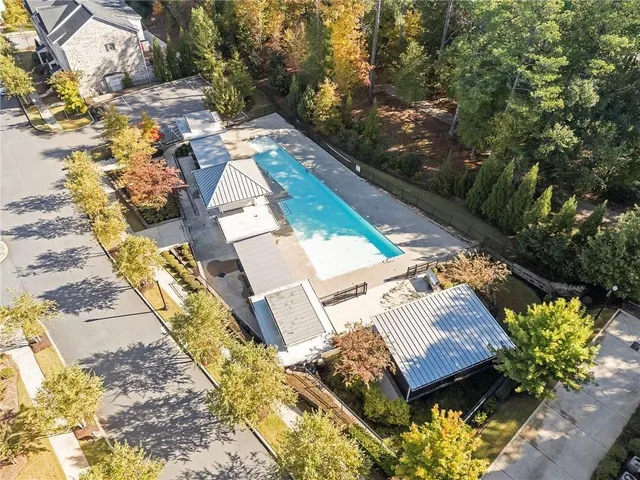 a view of swimming pool with a patio
