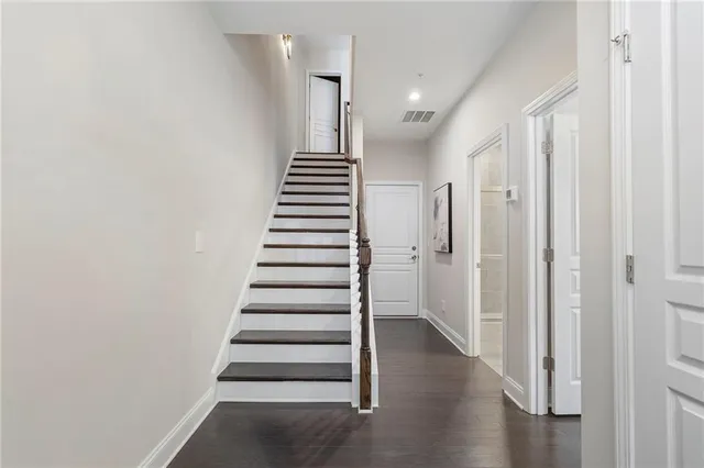 a view of entryway with wooden floor
